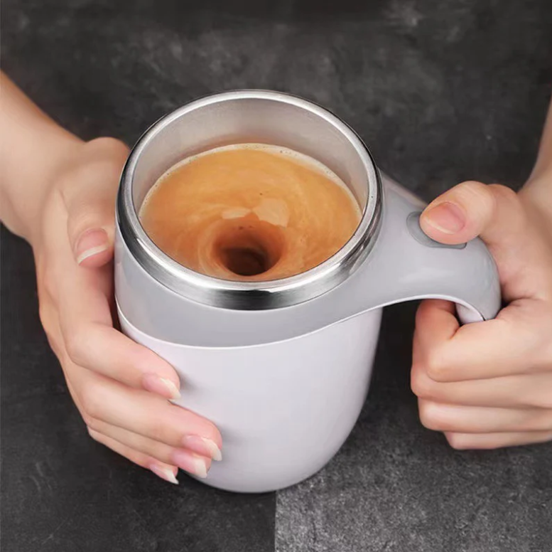 Self Stirring Coffee Mug in use